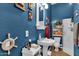 Nautically-themed bathroom with shower and pedestal sink at 1413 W Commerce Ave, Gilbert, AZ 85233