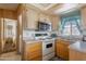Clean and functional kitchen, offering a microwave and sink at 7750 E Broadway Rd # 277, Mesa, AZ 85208
