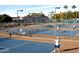 Multiple tennis courts with ample space for players at 7750 E Broadway Rd # 277, Mesa, AZ 85208