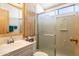 Bathroom with shower stall, vanity, and mirror at 7750 E Broadway Rd # 277, Mesa, AZ 85208