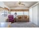 Living room with sofa, recliner, and carpet flooring at 7750 E Broadway Rd # 277, Mesa, AZ 85208