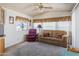 Living room with sofa, recliner, and carpet flooring at 7750 E Broadway Rd # 277, Mesa, AZ 85208