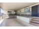 Covered patio with seating area and storage underneath at 7750 E Broadway Rd # 277, Mesa, AZ 85208