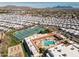 Aerial view of community with pool, tennis courts at 7750 E Broadway Rd # 277, Mesa, AZ 85208