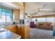 Kitchen with wood cabinets, breakfast bar and appliances at 7750 E Broadway Rd # 277, Mesa, AZ 85208