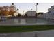 Well-maintained shuffleboard courts with benches at 7750 E Broadway Rd # 277, Mesa, AZ 85208