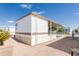 Side view of mobile home, showing exterior features at 7750 E Broadway Rd # 277, Mesa, AZ 85208
