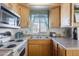 View of kitchen sink, stove and microwave at 7750 E Broadway Rd # 277, Mesa, AZ 85208