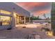 Backyard patio with a view of the pool and sunset at 29851 N 78Th Way, Scottsdale, AZ 85266