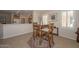 Cozy dining area with a table and four chairs at 17041 W Artesia Dr, Surprise, AZ 85387