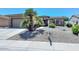 One-story house with desert landscaping at 17041 W Artesia Dr, Surprise, AZ 85387