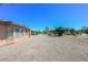 House exterior and backyard view at 17041 W Artesia Dr, Surprise, AZ 85387