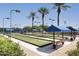 Outdoor bocce ball courts with shade structures and benches at 17041 W Artesia Dr, Surprise, AZ 85387