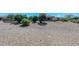 Backyard with gravel and desert landscaping at 17041 W Artesia Dr, Surprise, AZ 85387