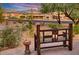 Landscaped front yard with seating area and desert plants at 26401 N Trails End --, Rio Verde, AZ 85263