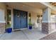 Welcoming front porch with double doors and stylish planters at 3353 E Blue Ridge Way, Gilbert, AZ 85298