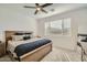 Spacious bedroom with a king-size bed and large window at 3103 E Hayfield Way, San Tan Valley, AZ 85140