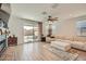 Comfortable living room with sliding door access to patio at 3103 E Hayfield Way, San Tan Valley, AZ 85140
