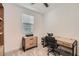 Home office features a desk, chair, and file cabinet at 3103 E Hayfield Way, San Tan Valley, AZ 85140