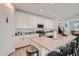Modern kitchen with a large island and stainless steel appliances at 3103 E Hayfield Way, San Tan Valley, AZ 85140