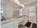 Modern bathroom with double vanity, large mirror, and shower at 3103 E Hayfield Way, San Tan Valley, AZ 85140