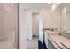Clean bathroom with a walk-in shower and double vanity at 3103 E Hayfield Way, San Tan Valley, AZ 85140