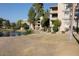 Condo building exterior, showcasing lake and green space at 5124 N 31St Pl # 524, Phoenix, AZ 85016