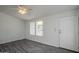 Bright living room featuring gray vinyl flooring and ceiling fan at 8865 E Baseline Rd # 1822, Mesa, AZ 85209