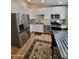 Modern kitchen featuring stainless steel appliances and granite countertops at 2060 E Quartz St, Mesa, AZ 85213