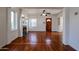Living room with hardwood floors, fireplace, and ceiling fan at 2322 N 8Th St, Phoenix, AZ 85006