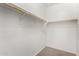 Walk-in closet with double rods and ample shelving at 10445 W Cordes Rd, Tolleson, AZ 85353