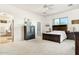 Spacious bedroom with dresser and ensuite bathroom at 44811 N 12Th St, New River, AZ 85087