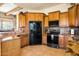 Kitchen with granite countertops and wood cabinets at 44811 N 12Th St, New River, AZ 85087