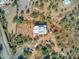 Aerial view of stucco home with flat roof and desert landscaping at 44811 N 12Th St, New River, AZ 85087
