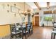 Bright dining room with rustic decor and chandelier at 44811 N 12Th St, New River, AZ 85087