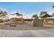 Community playground with slides and shade structures at 3730 E Cat Balue Dr, Phoenix, AZ 85050