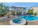 Inviting backyard oasis with a large pool and spa at 3730 E Cat Balue Dr, Phoenix, AZ 85050