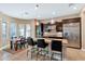 Bright kitchen with an island, stainless steel appliances, and a breakfast nook at 3730 E Cat Balue Dr, Phoenix, AZ 85050