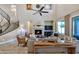 Two-story living room features a fireplace, high ceilings and plenty of natural light at 3730 E Cat Balue Dr, Phoenix, AZ 85050