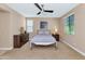 Comfortable bedroom with a double bed, dresser, and window at 3730 E Cat Balue Dr, Phoenix, AZ 85050