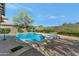 Refreshing pool and spa surrounded by a gravel patio at 3730 E Cat Balue Dr, Phoenix, AZ 85050
