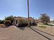 Side view of single story home with desert landscaping at 13607 W Springdale Dr, Sun City West, AZ 85375