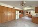 Kitchen with ample cabinetry and white appliances at 13607 W Springdale Dr, Sun City West, AZ 85375