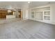 Open living room with built-in shelving and kitchen views at 2682 E Dublin St, Gilbert, AZ 85295