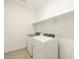 Bright laundry room with washer and dryer included at 16020 W Hackamore Dr, Surprise, AZ 85387