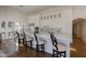 Gourmet kitchen with a large island, white cabinetry, and marble countertops at 4333 E Mcdonald Dr, Phoenix, AZ 85018