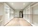 Large walk-in closet with custom built-ins and wood floors at 4333 E Mcdonald Dr, Phoenix, AZ 85018