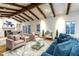 Elegant living room featuring hardwood floors, a fireplace, and ample natural light at 4333 E Mcdonald Dr, Phoenix, AZ 85018