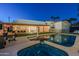 Stunning backyard with pool, spa, and covered patio; perfect for entertaining at 4333 E Mcdonald Dr, Phoenix, AZ 85018