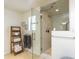 Large walk-in shower with marble tile and glass enclosure at 4333 E Mcdonald Dr, Phoenix, AZ 85018